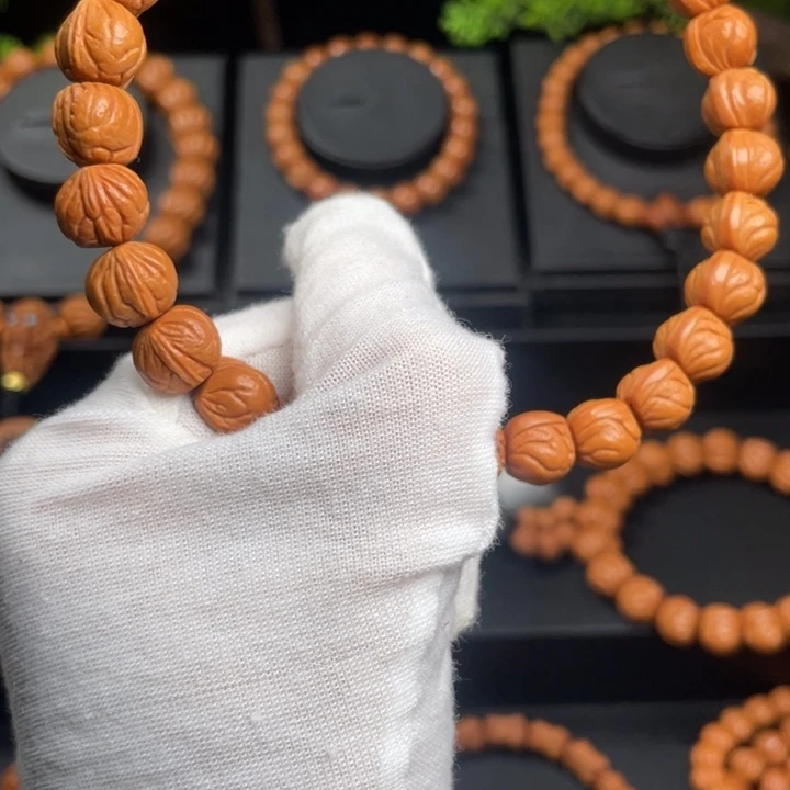 赵***大木质类精品桃核手持