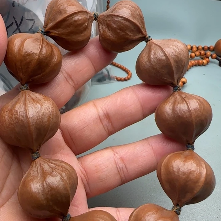 东***方橄榄核手串橄榄核 原皮铁核四花