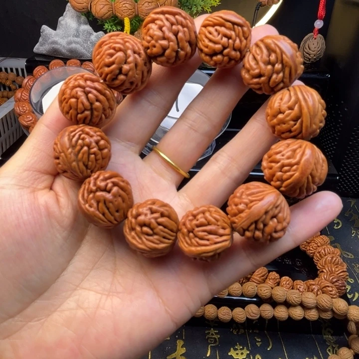 曹***德手串桃核刺龙单圈