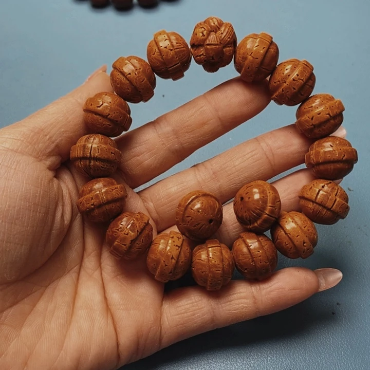 桃核手串万贯17花皮色差15颗