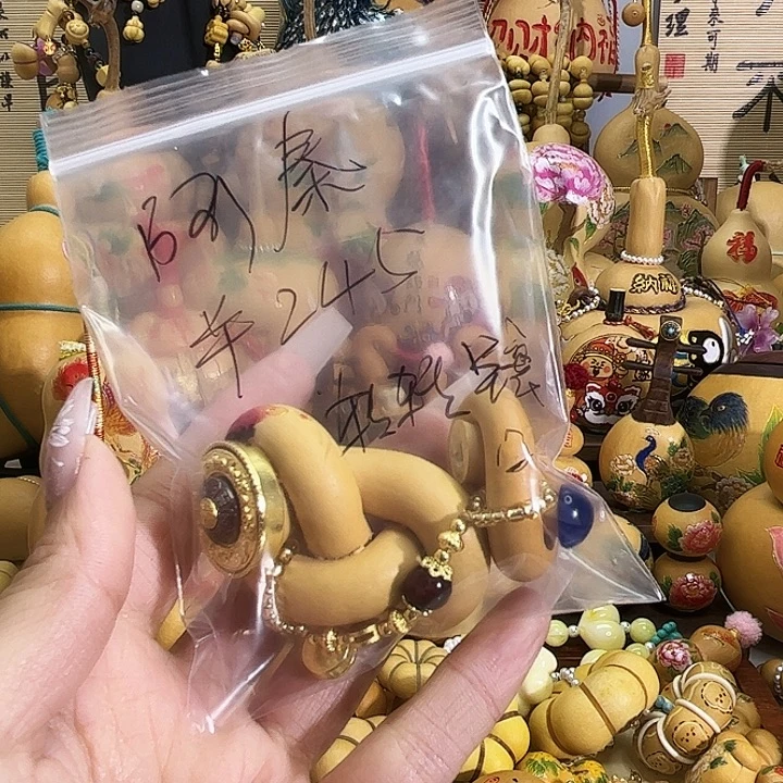 阿****木质类纯手工磨刻葫芦