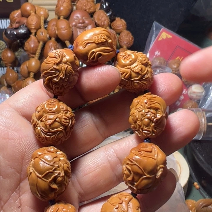 橄榄核手串/手链已*置橄榄核老弥勒佛泛红油