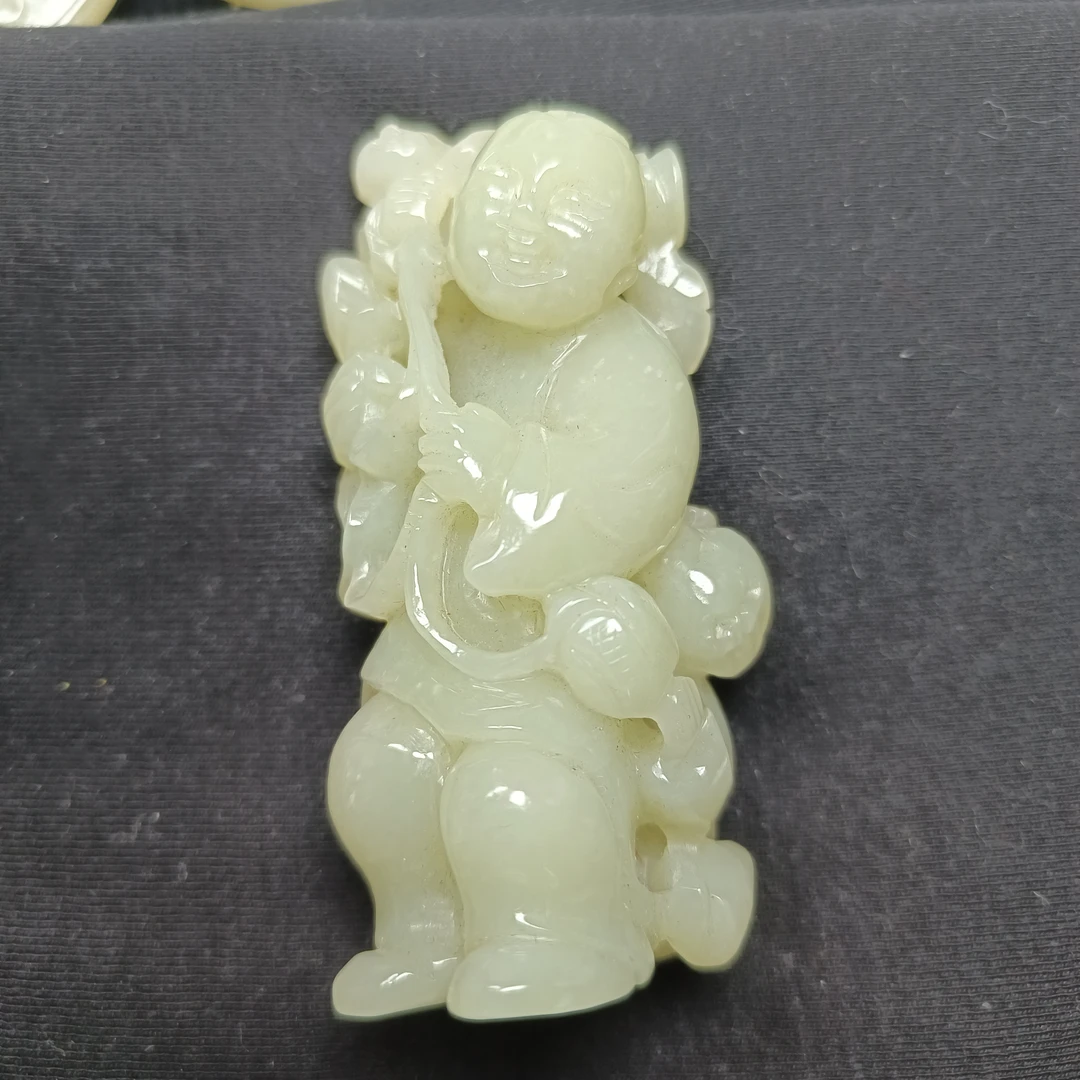 新疆和田玉手把件童子