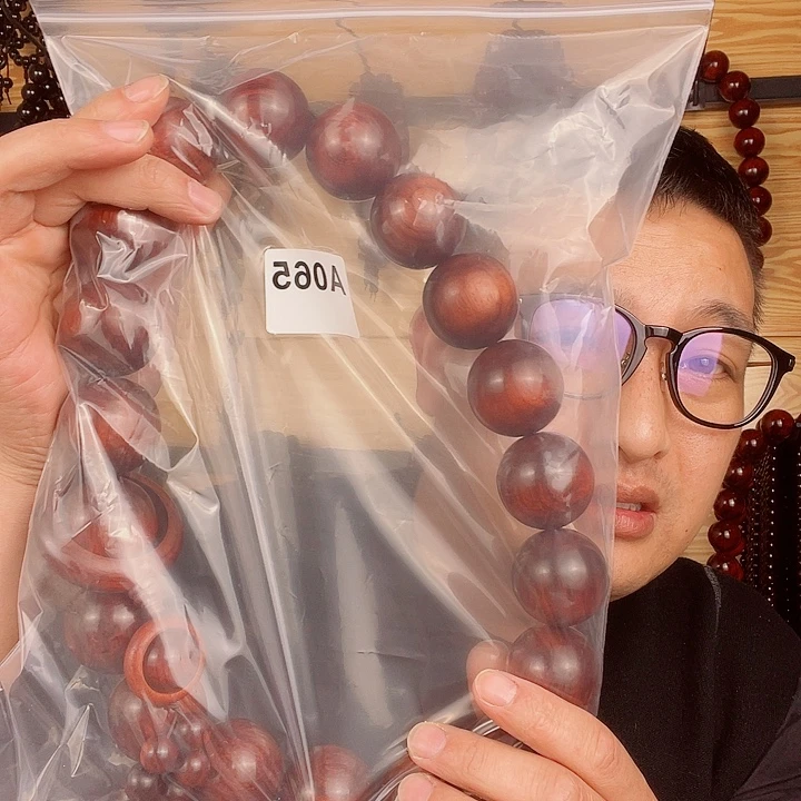 刘***君木紫檀3.5手持。065号