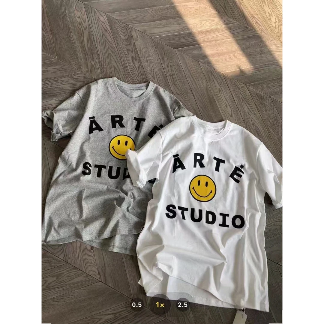 七格格推荐大码欧货笑脸春款显瘦涂鸦半袖1609