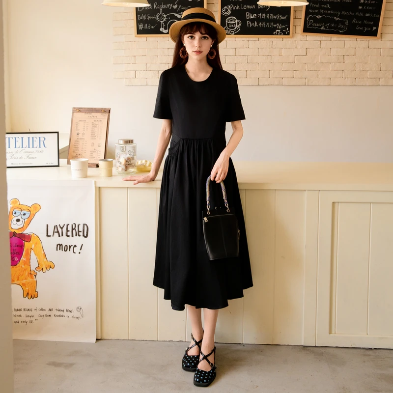 谜底小黑裙连衣裙2025夏季新款简约圆领大摆中长裙短袖256ML6501