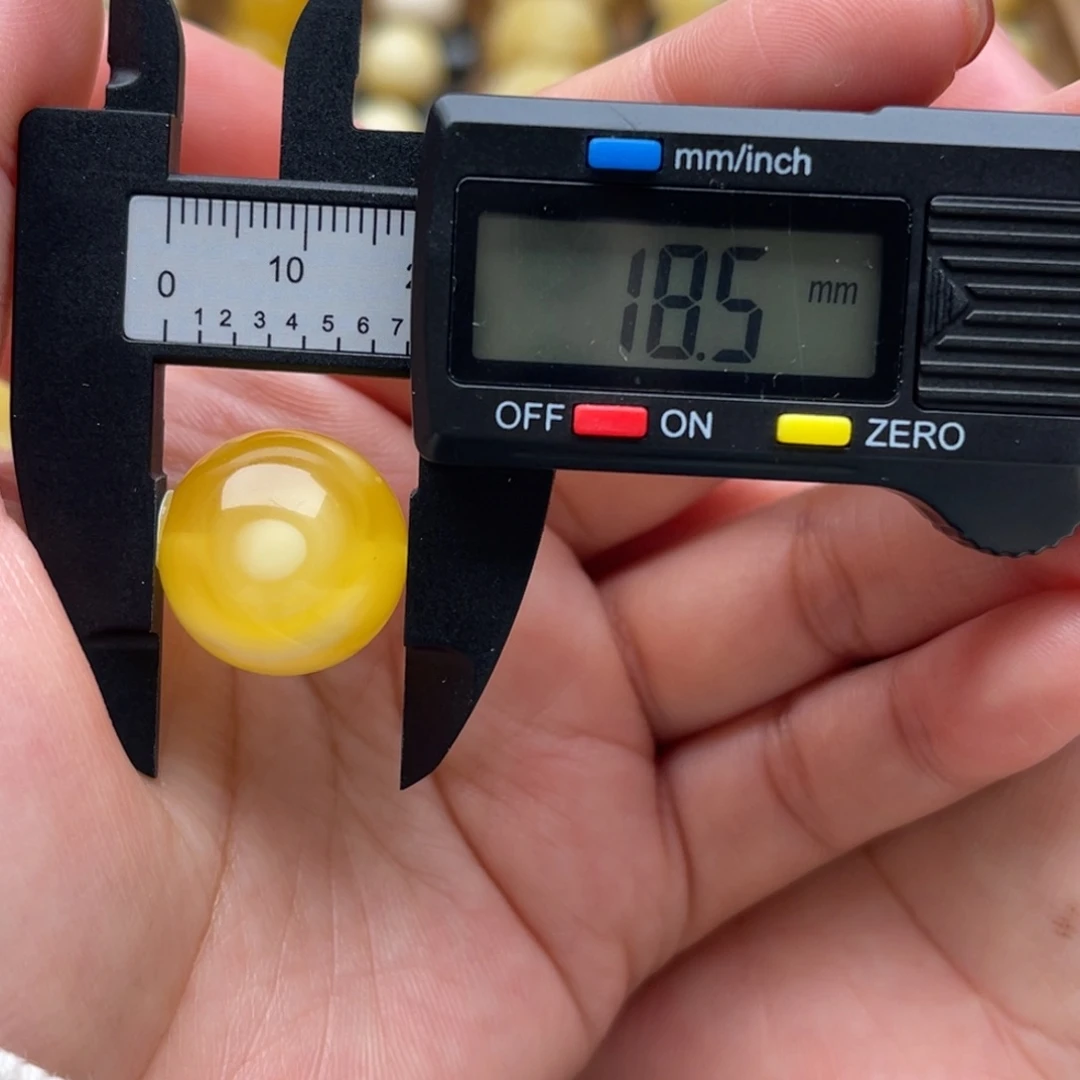 琥珀未镶嵌裸石蜜蜡圆珠笑