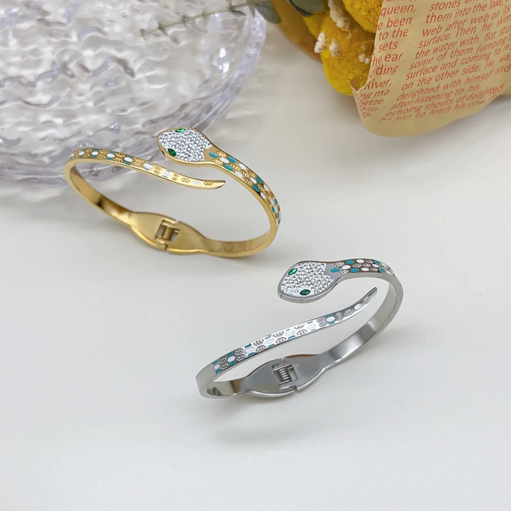 钛钢仿水晶手镯 49338 HOA 金色灵蛇钛钢手镯一个，两色，圈口57mm