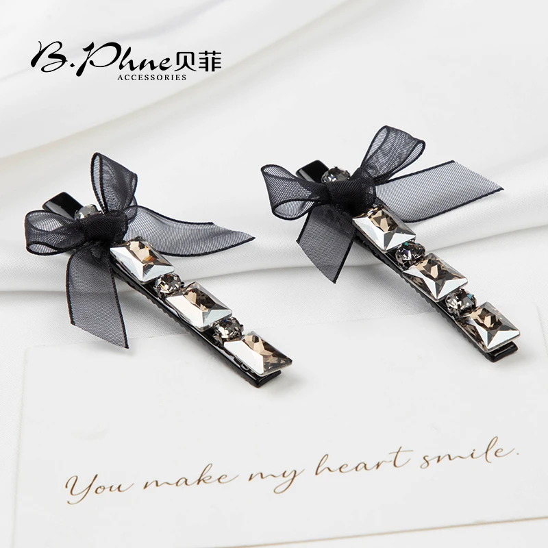 B.【贝菲】蝴蝶结丝带鸭嘴夹百搭优雅