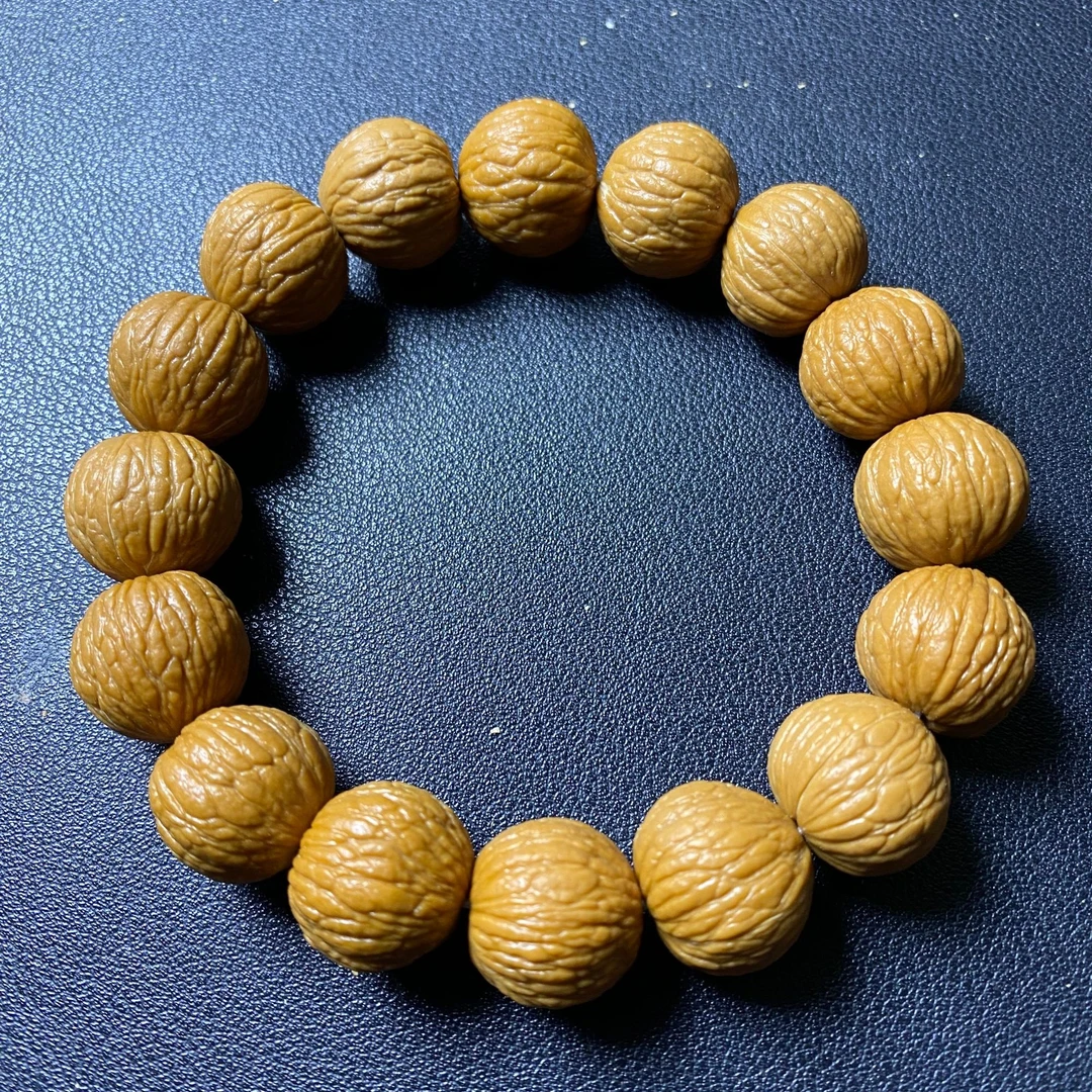 【镇元出品】原皮原色老树猴头凤羽手串15-16mm   全品