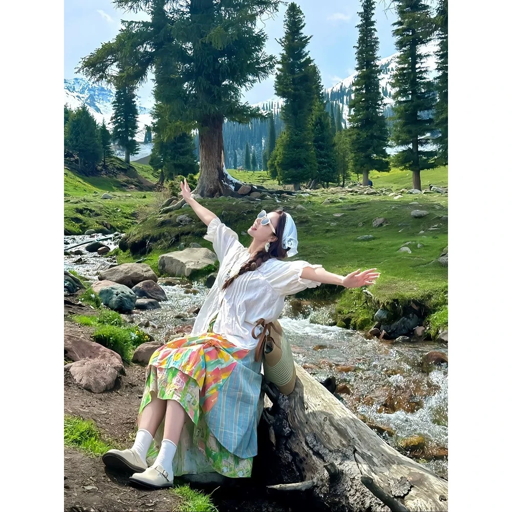 新疆川西草原旅游穿搭套装夏今年流行不规则碎花半身裙衬衫两件套