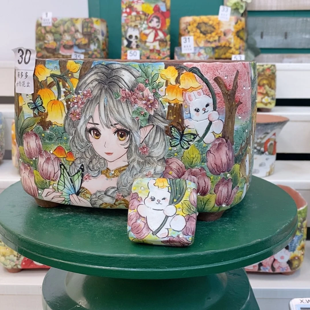 红陶云****所萌多多手绘花盆