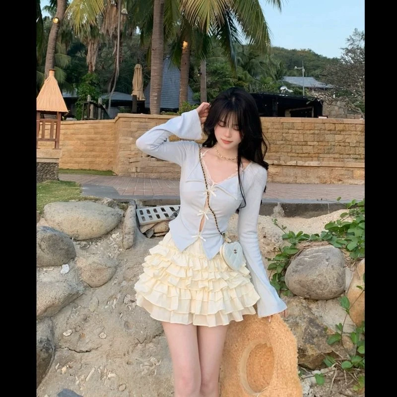 纯欲甜美蝴蝶结翻V领微喇袖小心机针织小众上衣女套