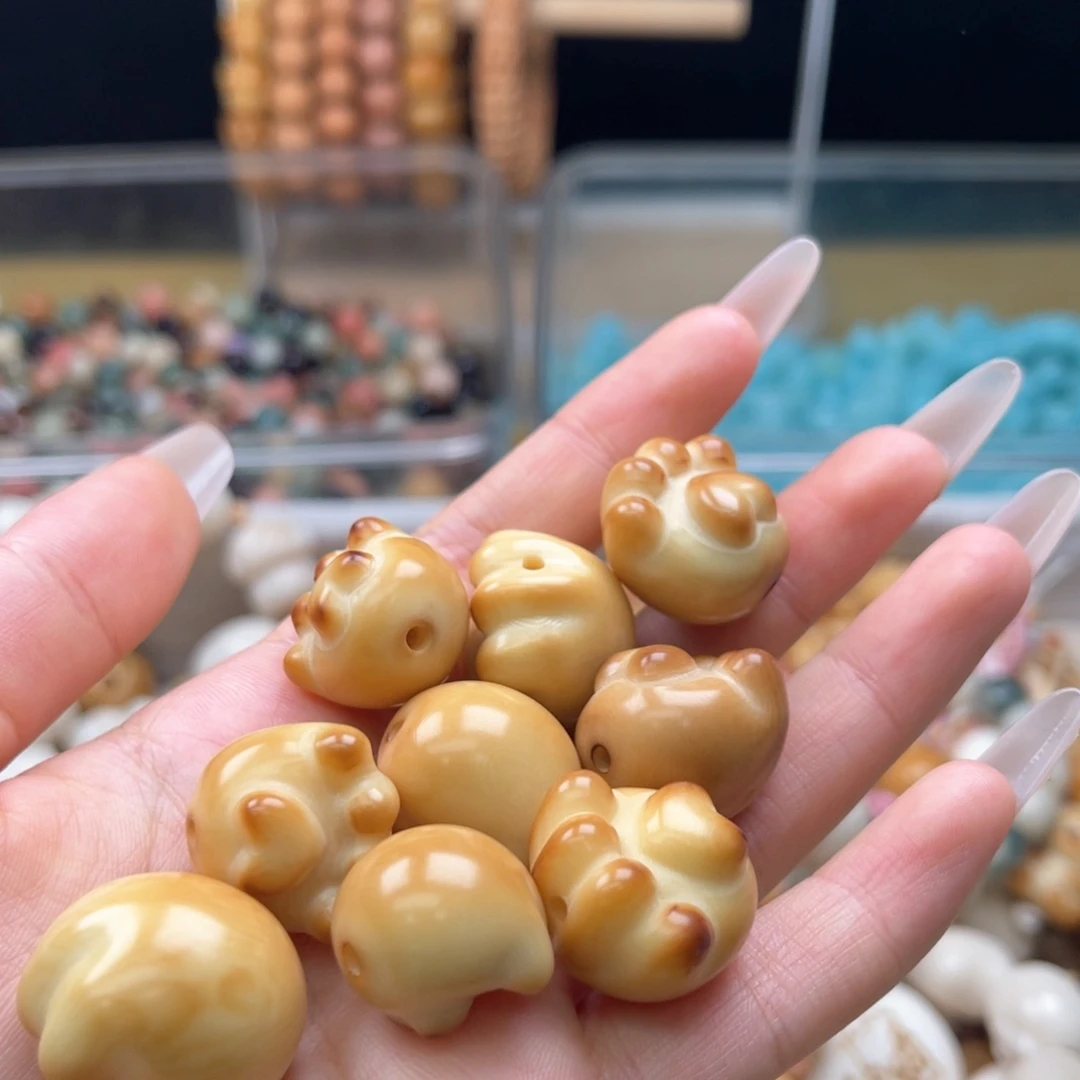 白玉菩提吊坠b25mm/象牙果炭烤猫爪一个