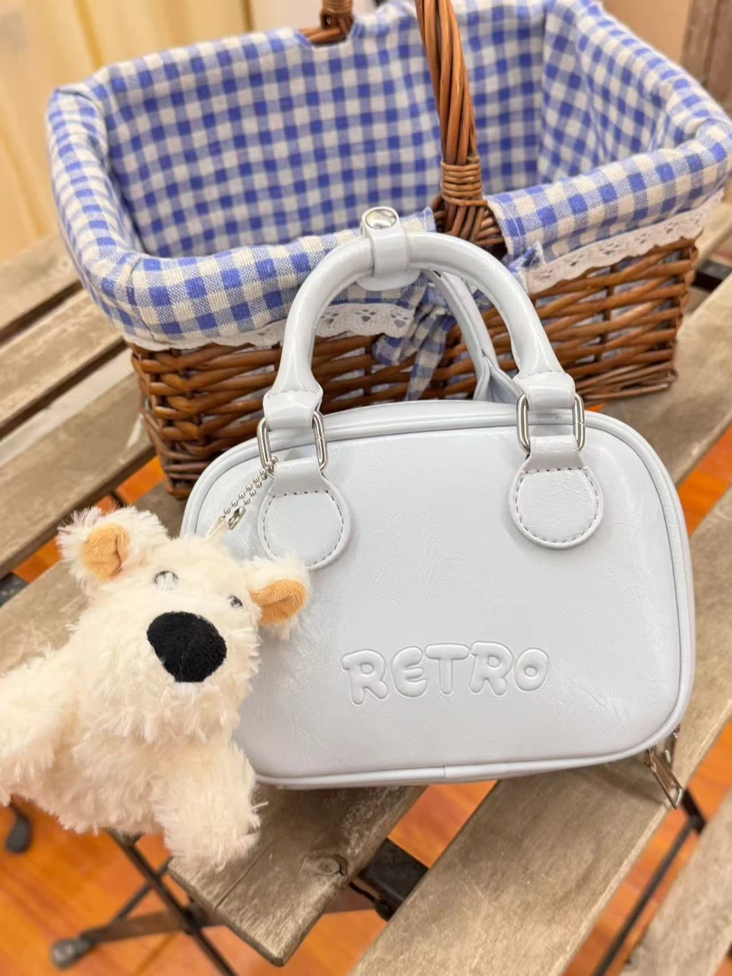 韩国早春新款春夏可爱风印花蓝色2025年保龄球包包ins卡通韩版潮！