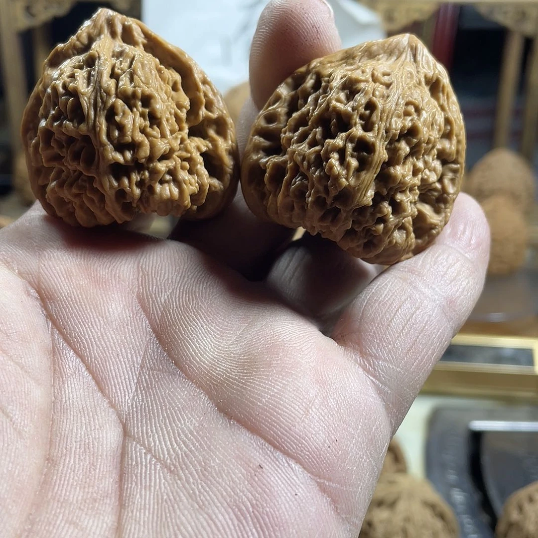 桃核吊坠?**藤文玩核桃南将石