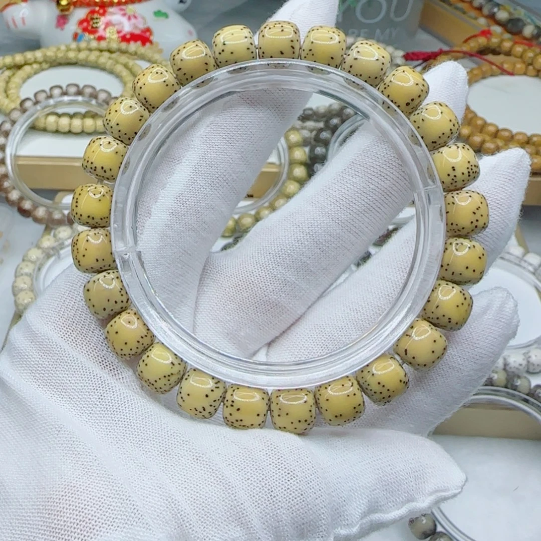 星月菩提手串鸡油黄9×8半侧留白a13