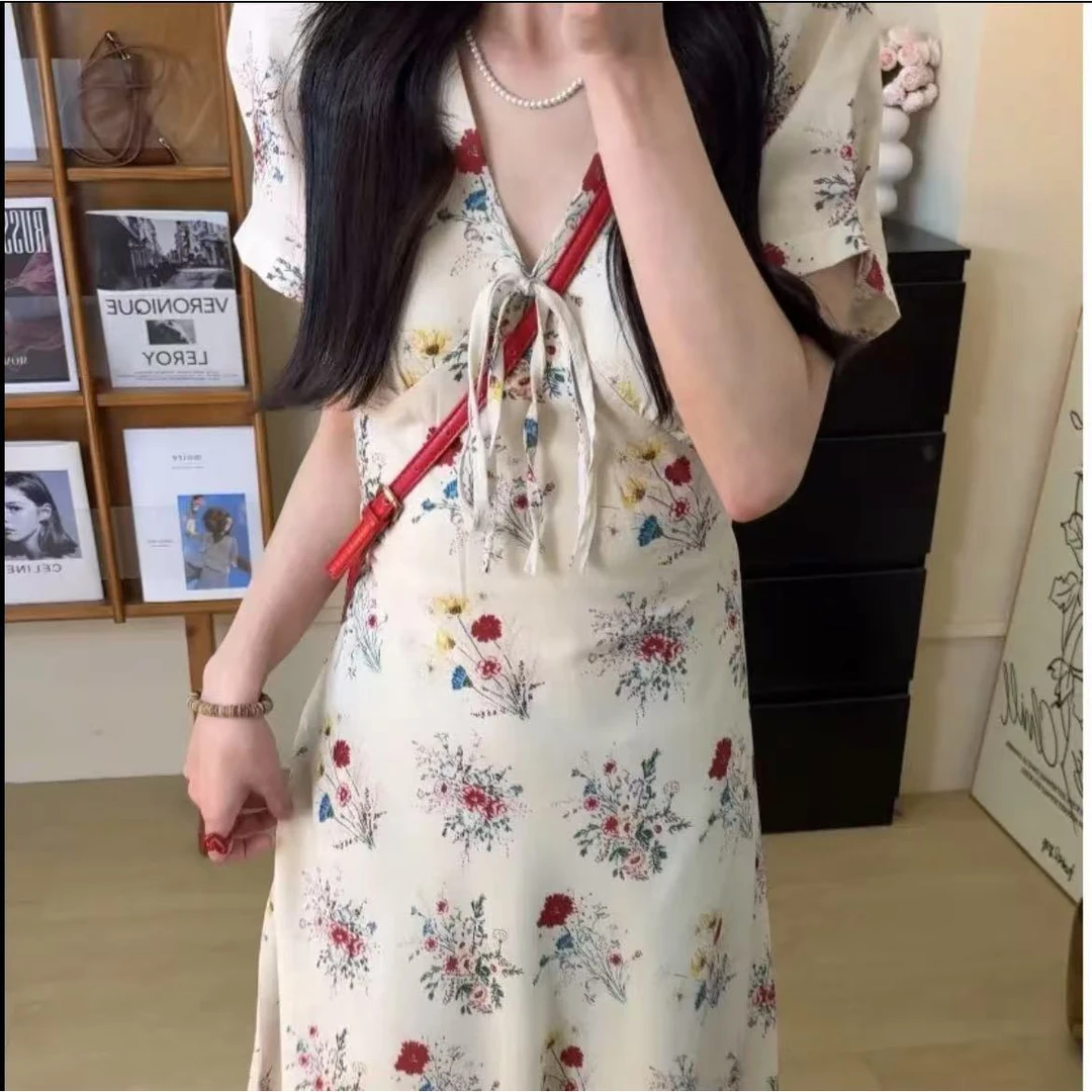 大码女装胖mm法式气质碎花短袖连衣裙显瘦遮肚度假长款连衣裙
