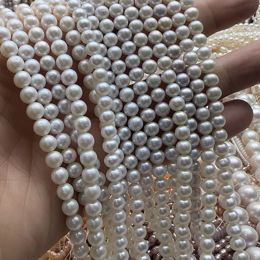 若***翼未镶嵌半成品淡水珍珠卡6正圆
