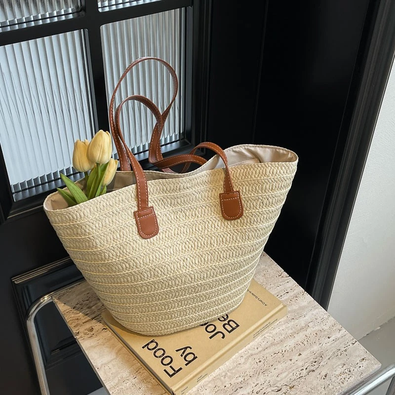 夏季流行草编大容量包包女2025休闲度假拍照沙滩包百搭休闲托特包