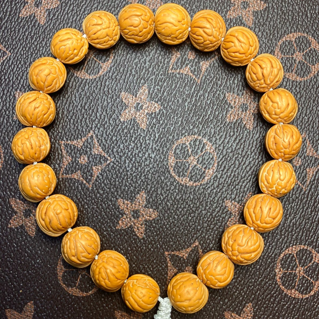 野生小肠纹桃核手持长串