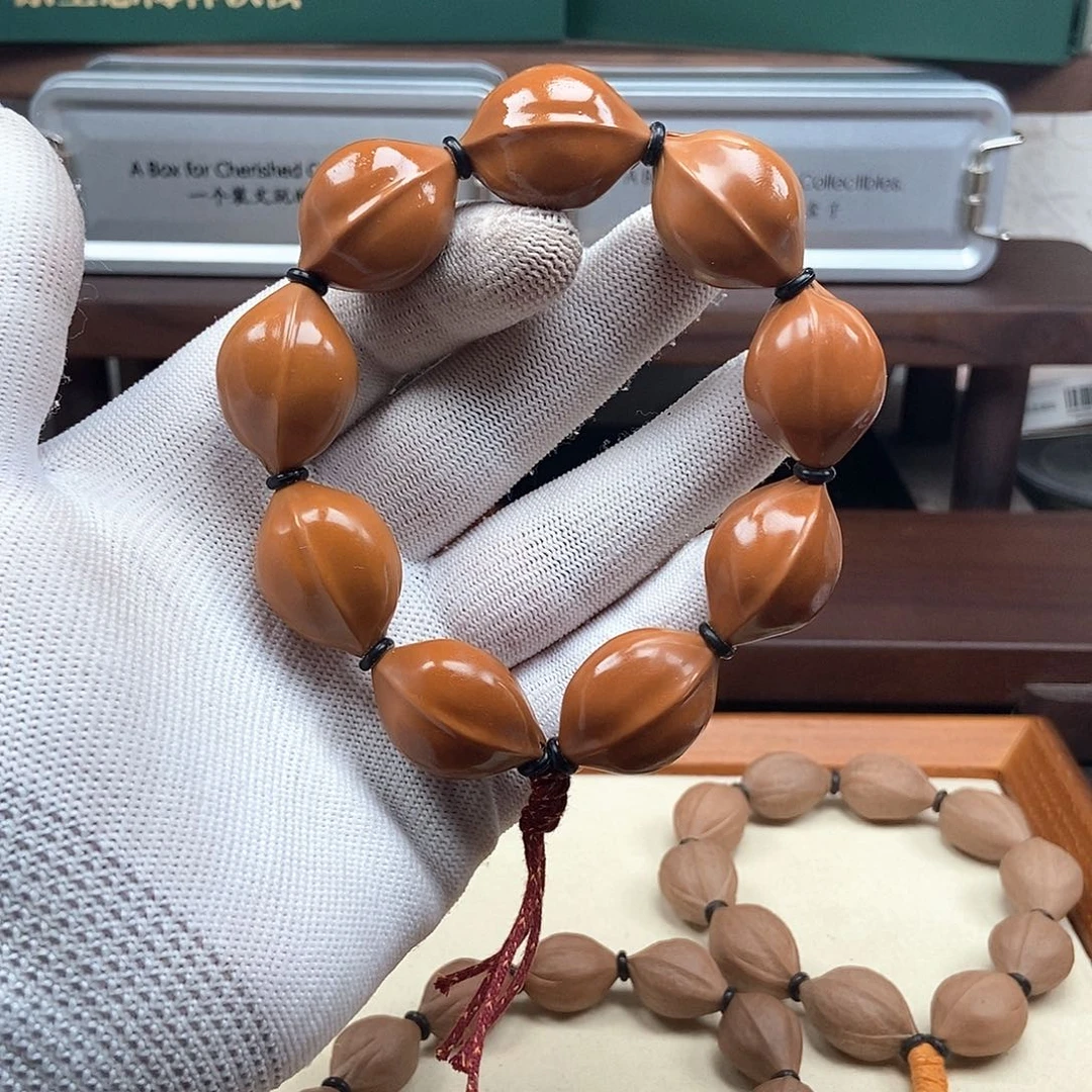 橄榄核手串往**风2028三花大籽去霜打底
