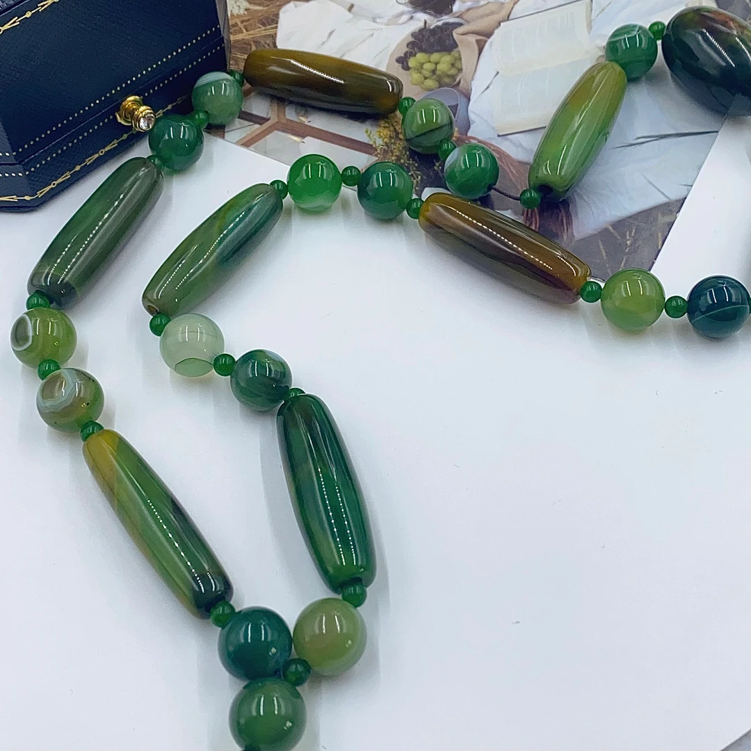2550   极 光 绿 骨 碎 补 项链多样性发货