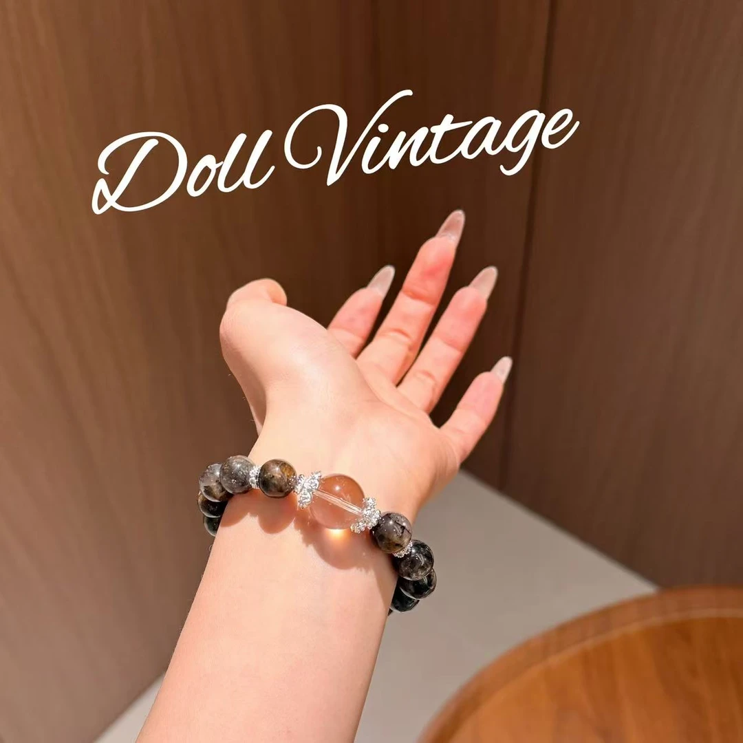 F152-闪灵茶晶顶珠手串