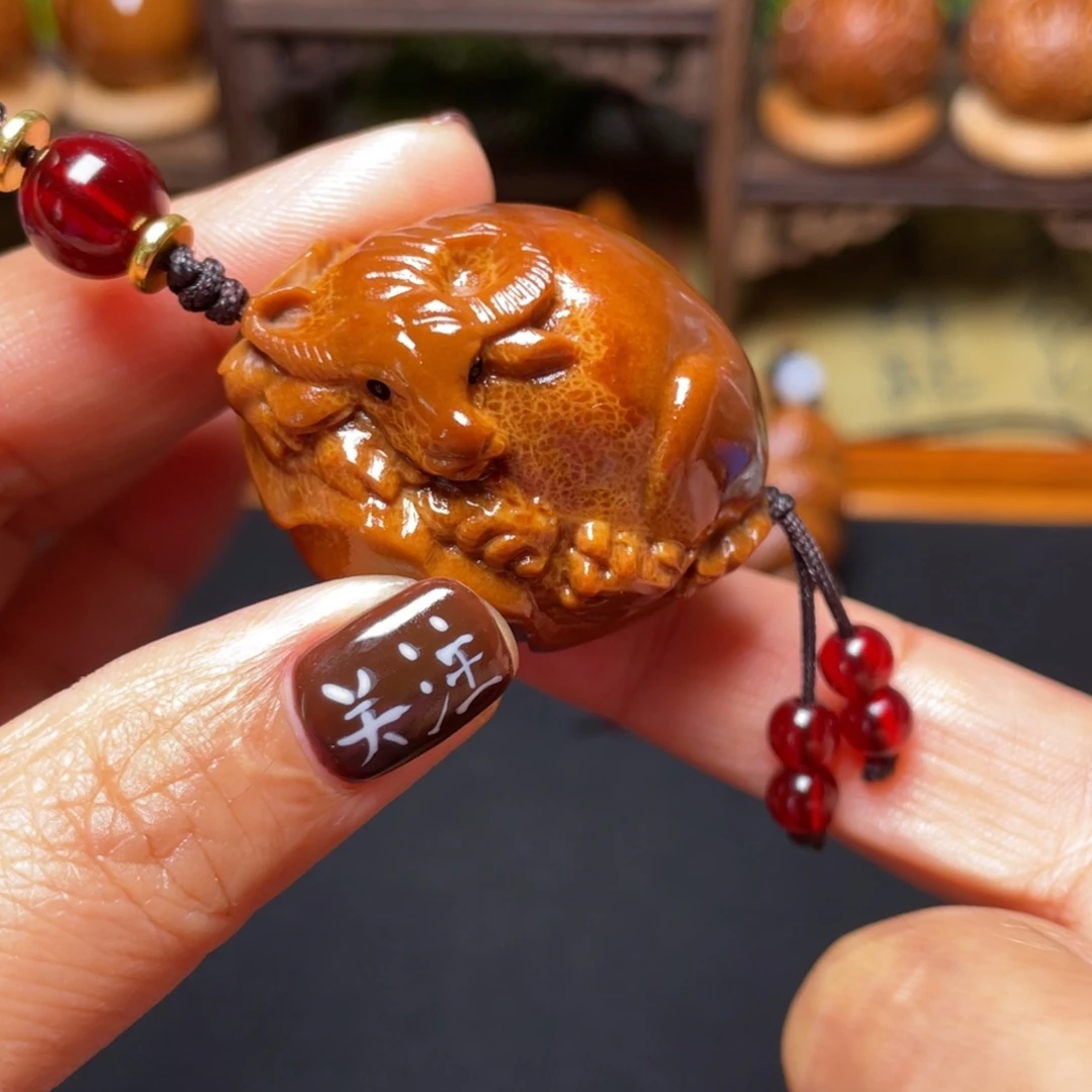 橄榄核吊坠牛掰穿配