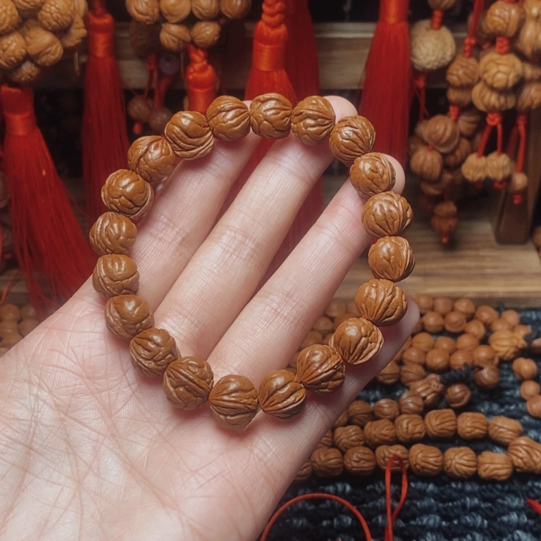 吊坠桃核桃枭手串