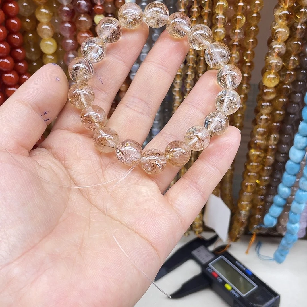昱***`手链水晶银S925镶嵌金珀胶花11+