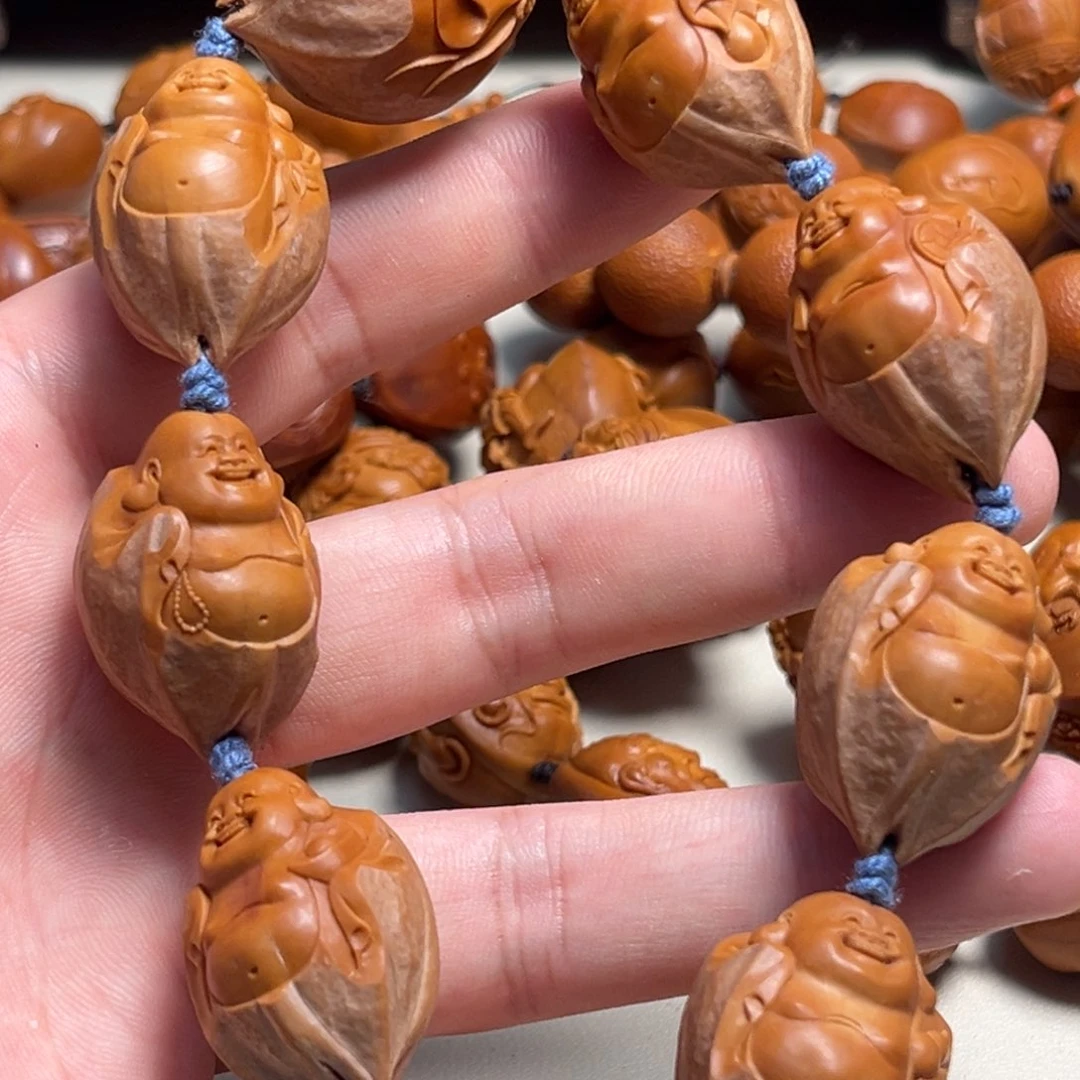 橄榄核吊坠唰***唰包衣弥勒