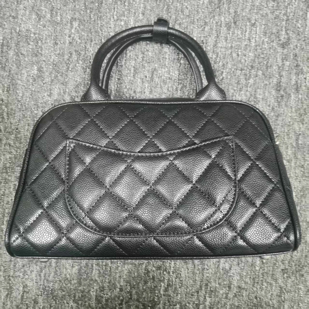 姝宴真皮女包手提梯形黑色