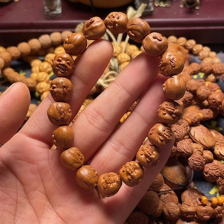 M****e龙纹桃核雕刻开心瑕疵