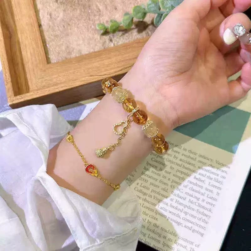 合成金属仿水晶手链 11mm水晶手串招财聚运黄水晶金发晶轻奢设计