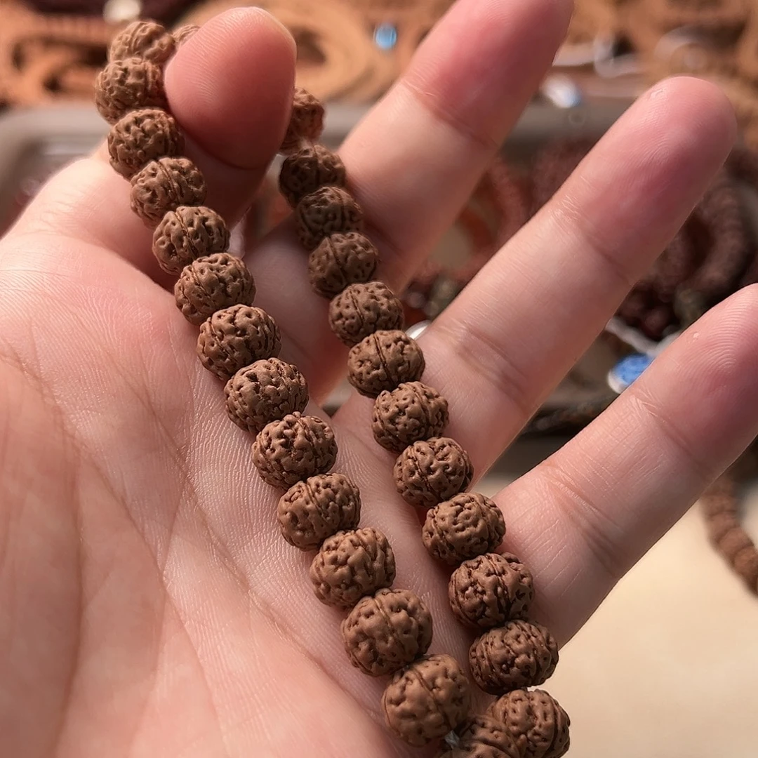 -***乐吊坠金刚菩提老树王手持11