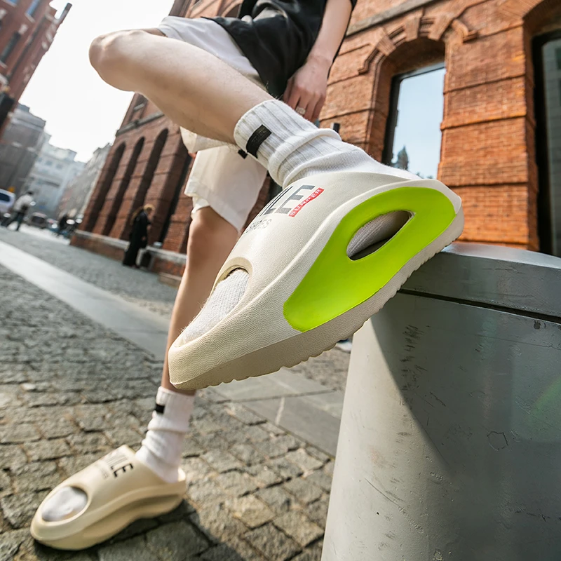 男士夏季新款运动厚底椰子拖鞋印花字母EVA踩屎感防滑情侣凉拖鞋