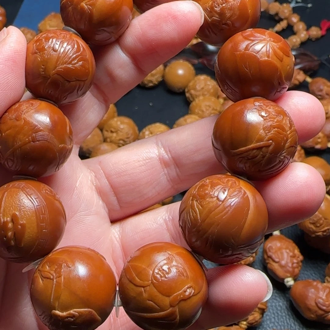 浩***业橄榄核手串/手链2.05正圆罗汉