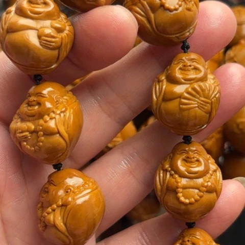 橄榄核雕灯泡弥勒