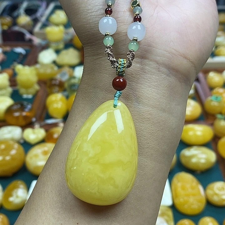 琥珀未镶嵌裸石白花蜡水滴吊坠