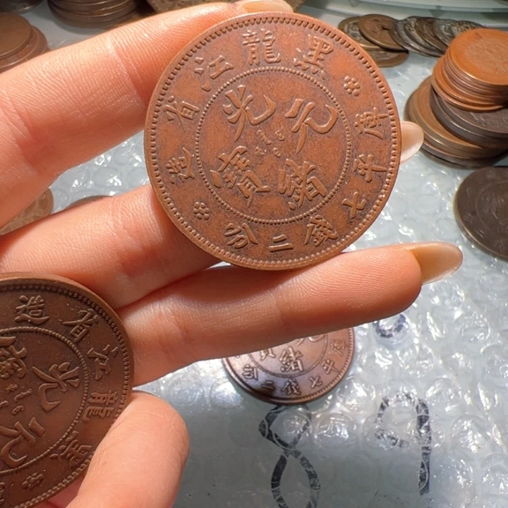 畅***7一个铜币工艺品摆件