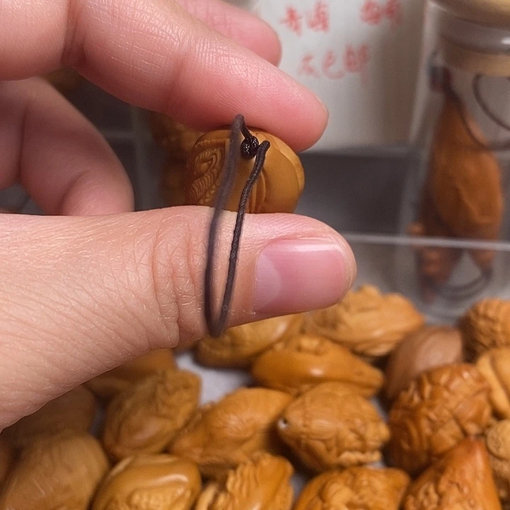 吊坠橄榄核生命，三面