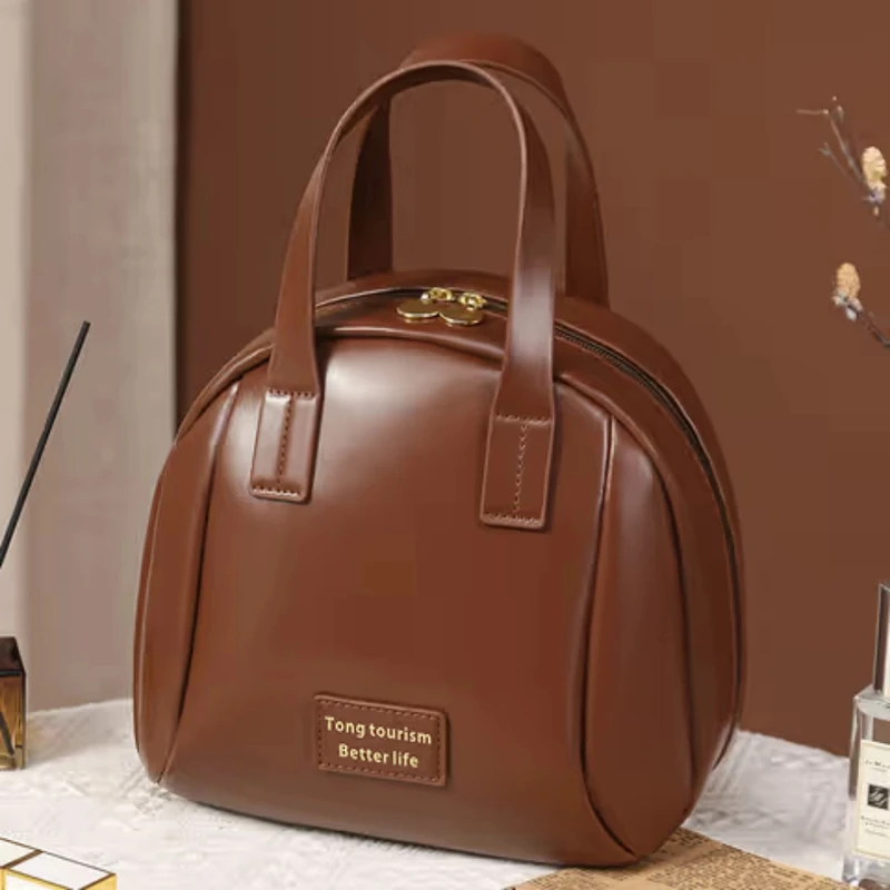 大容量皮质高级感化妆包漱包旅行出差防水时尚贝壳包女