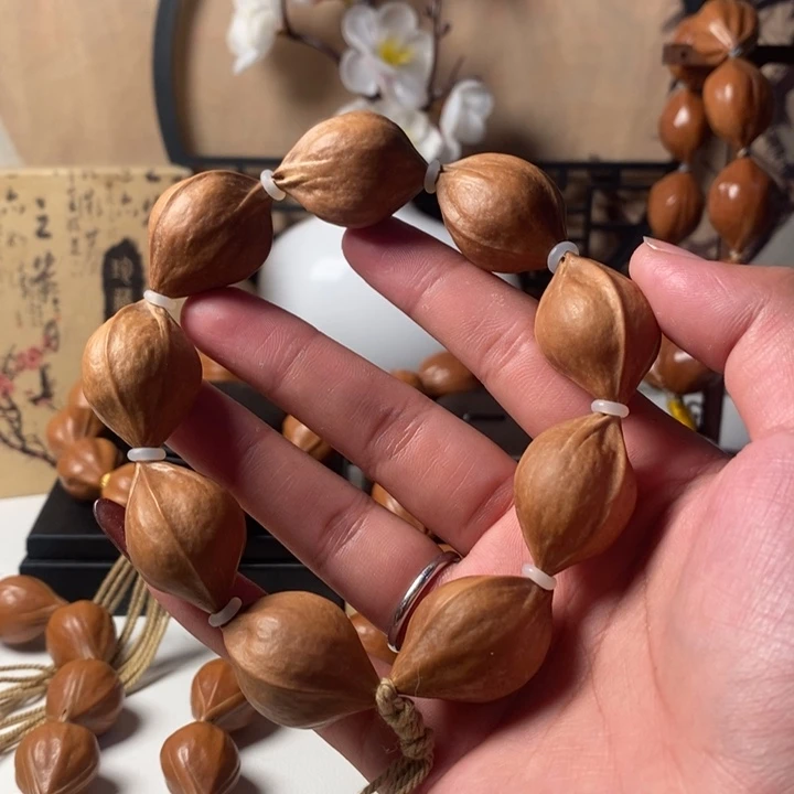 子***鱼橄榄核其他2.3三花9 圆皮