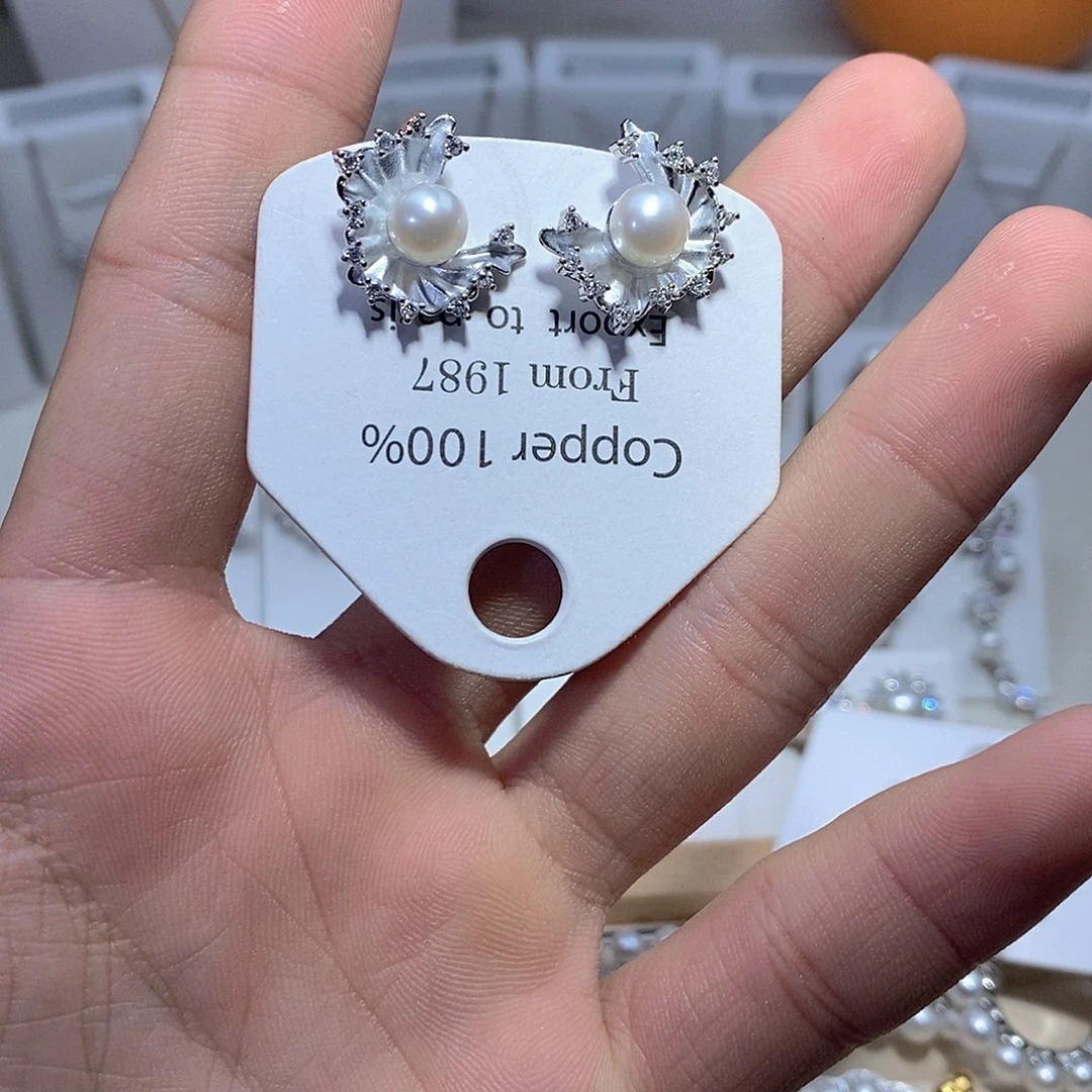 淡水珍珠银S925镶嵌耳饰