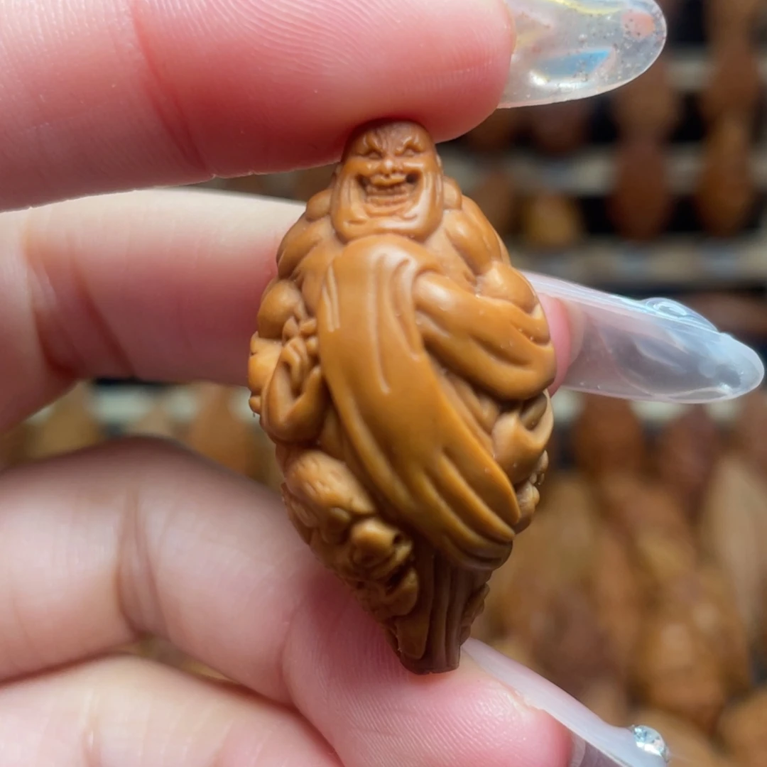 把件橄榄核强招恶僧