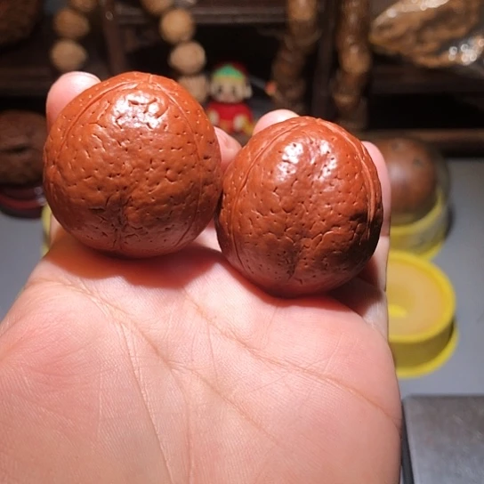 把件橄榄核三瓣金刚光头强