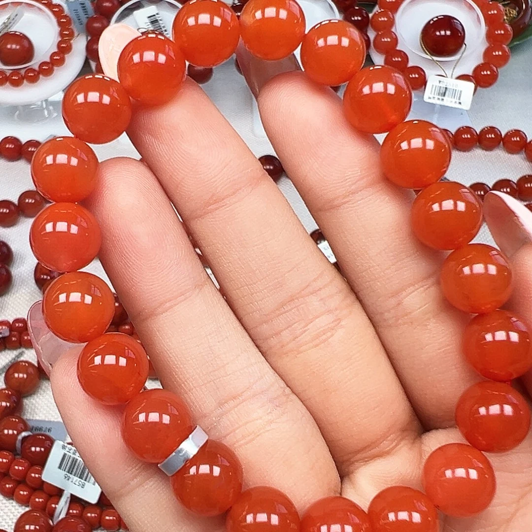 赵***江南红玛瑙未镶嵌手串精品 保山河湾冰红起荧光卡9mm+