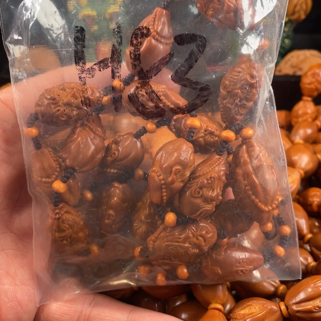 橄榄核其他橄榄核雕工艺手串 瑕疵介意勿拍