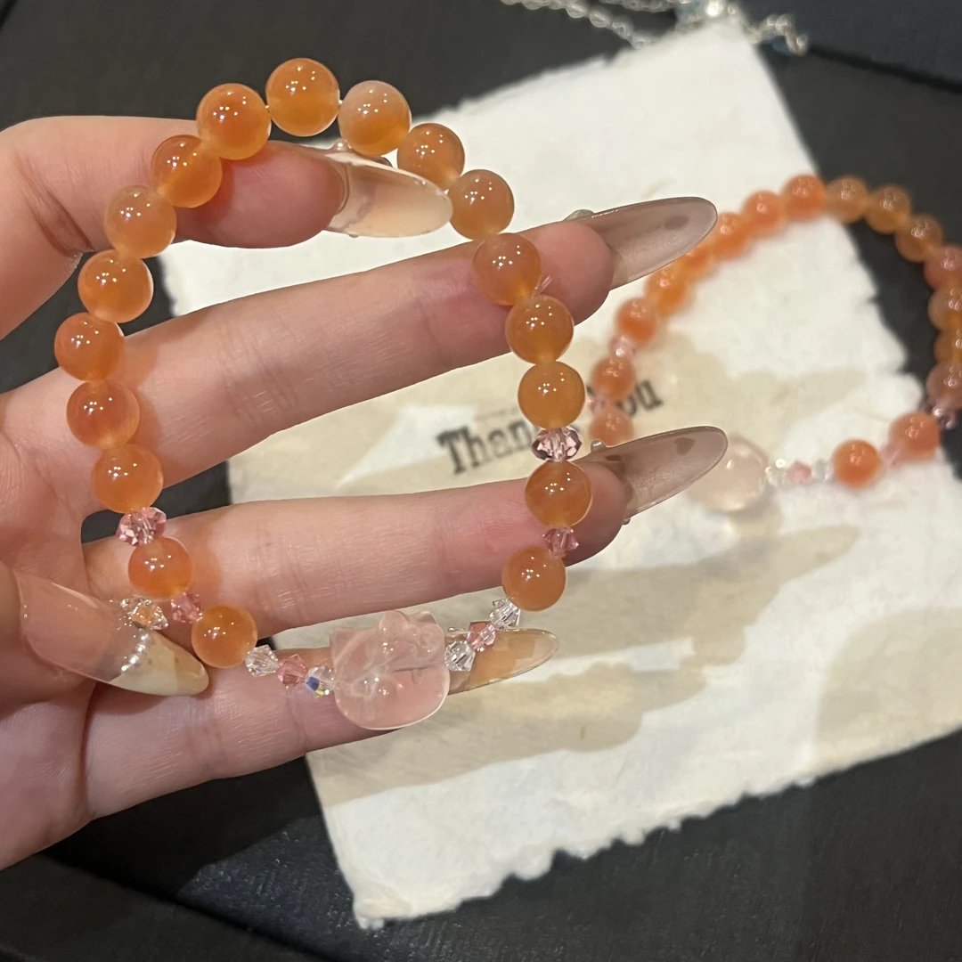 s955 「芬达kt」玛瑙糖心kt猫设计款手串 颜色微差